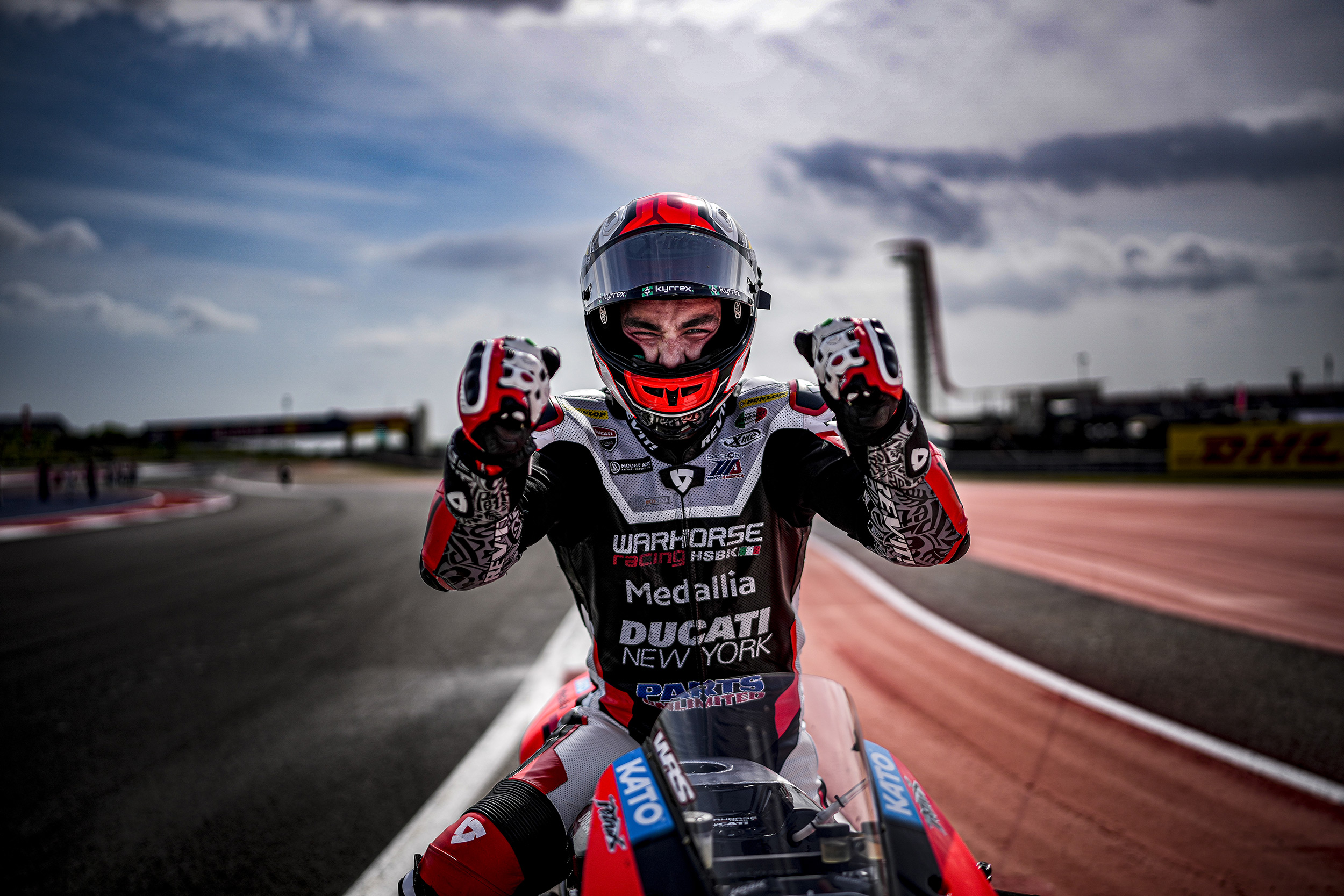 motogp-rider-celebrates-winning.jpeg
