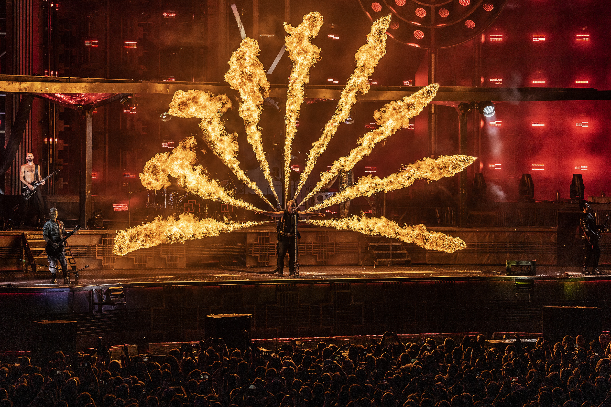 rammstein-playing-live-on-stage-with-a-fire-display.jpeg
