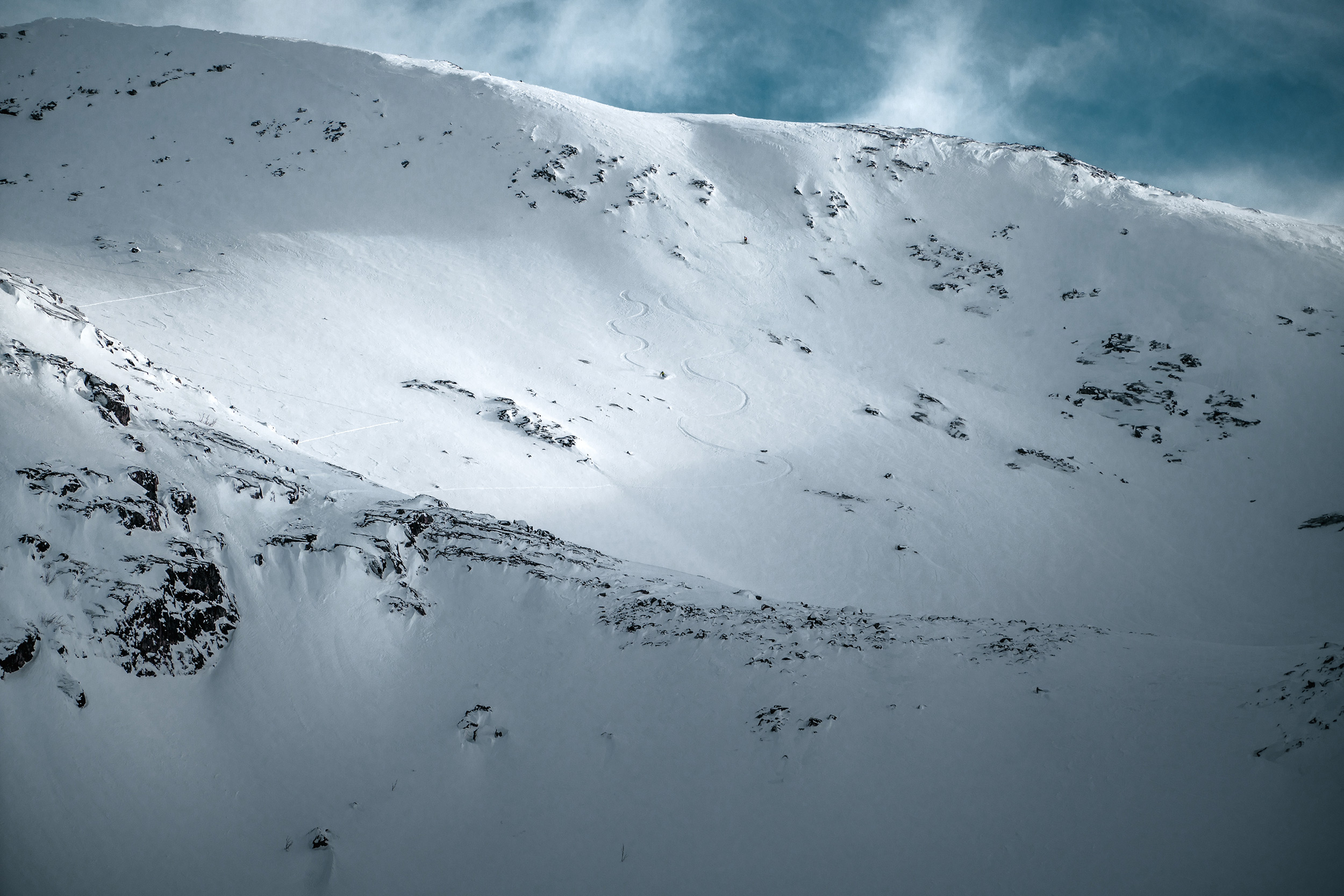 soft-light-hitting-a-snow-covered-mountain.jpeg