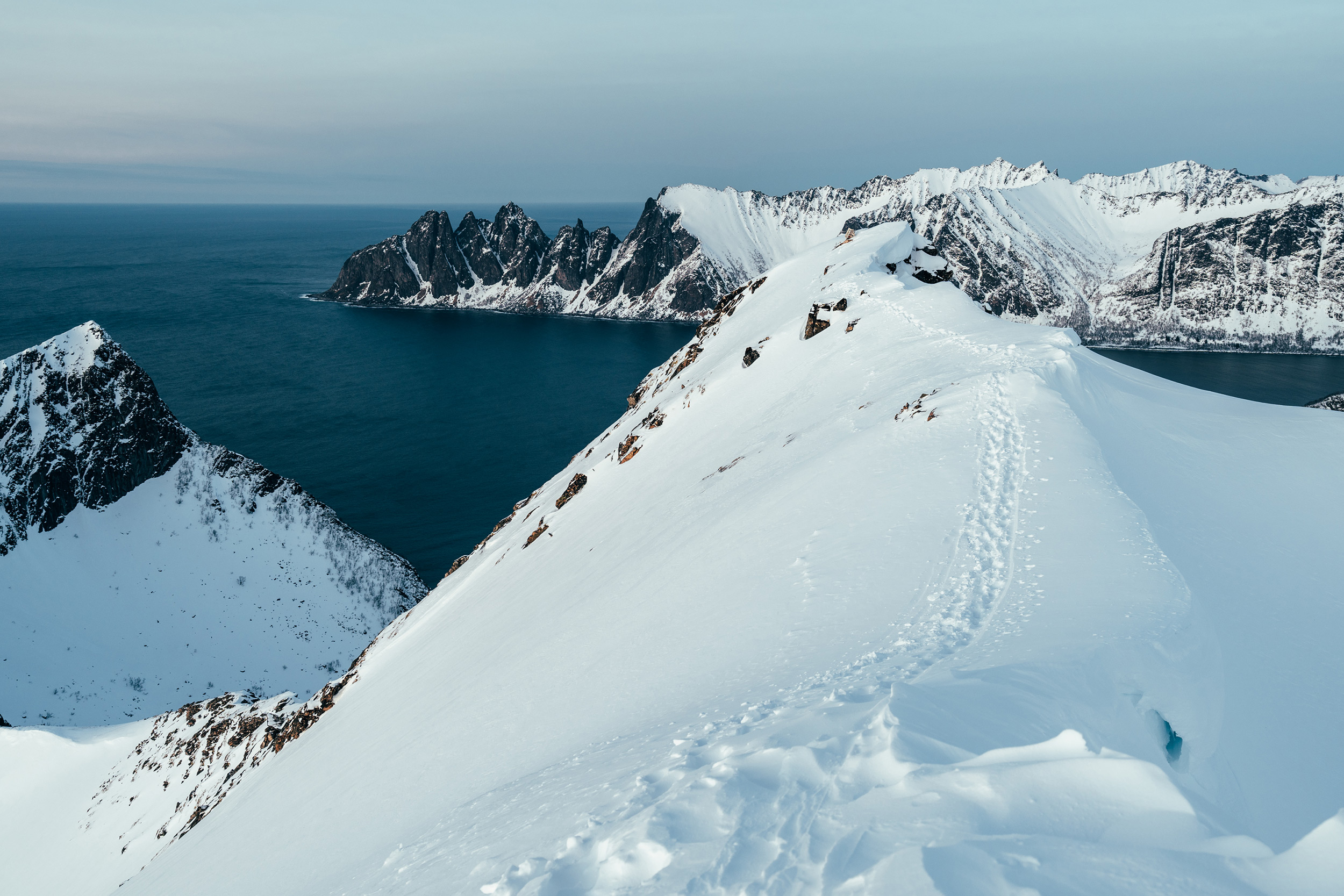 footprints-in-the-snow-atop-a-mountain.jpeg