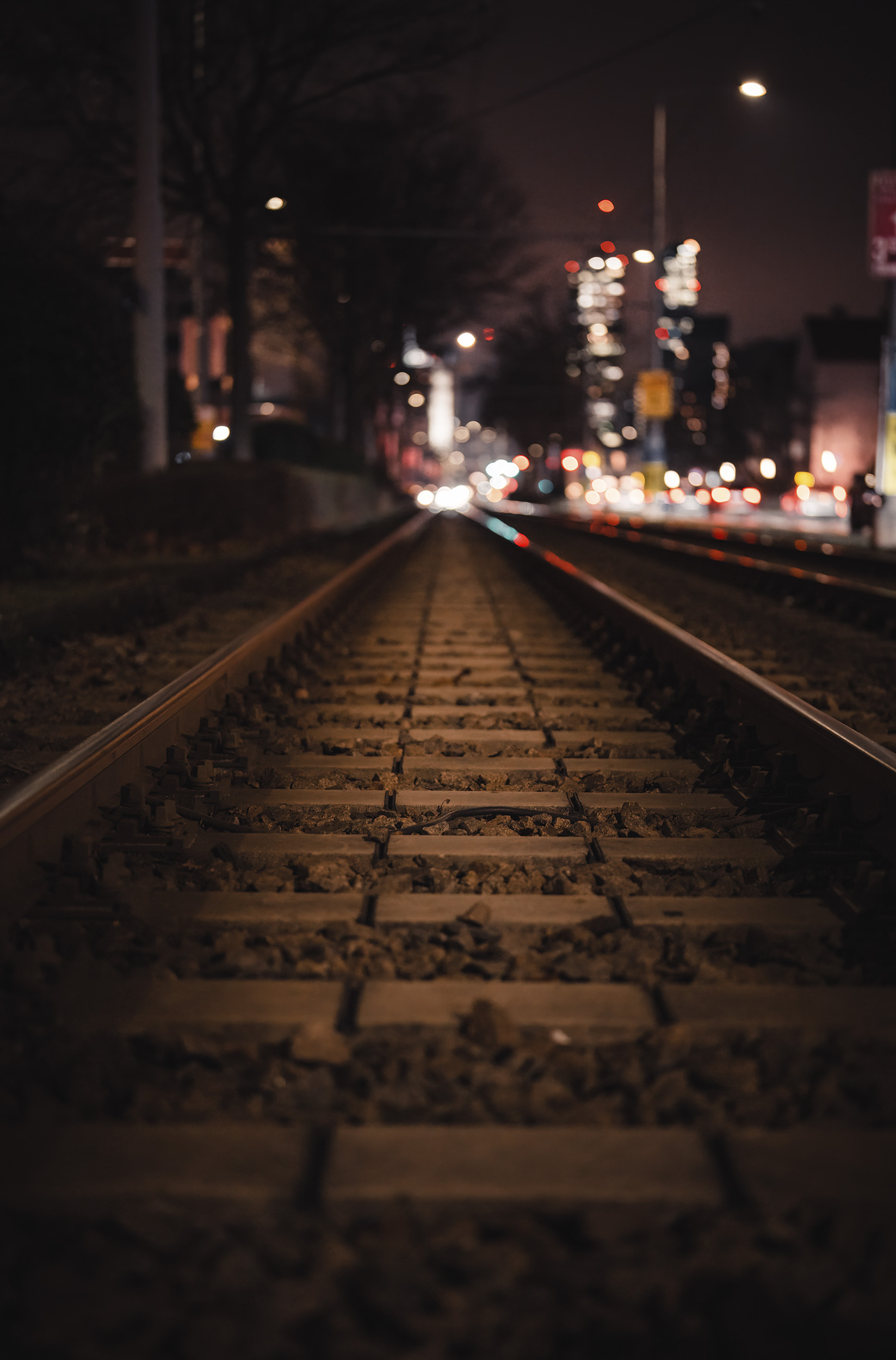 tram-tracks-leading-off-into-the-distance-at-night.jpg