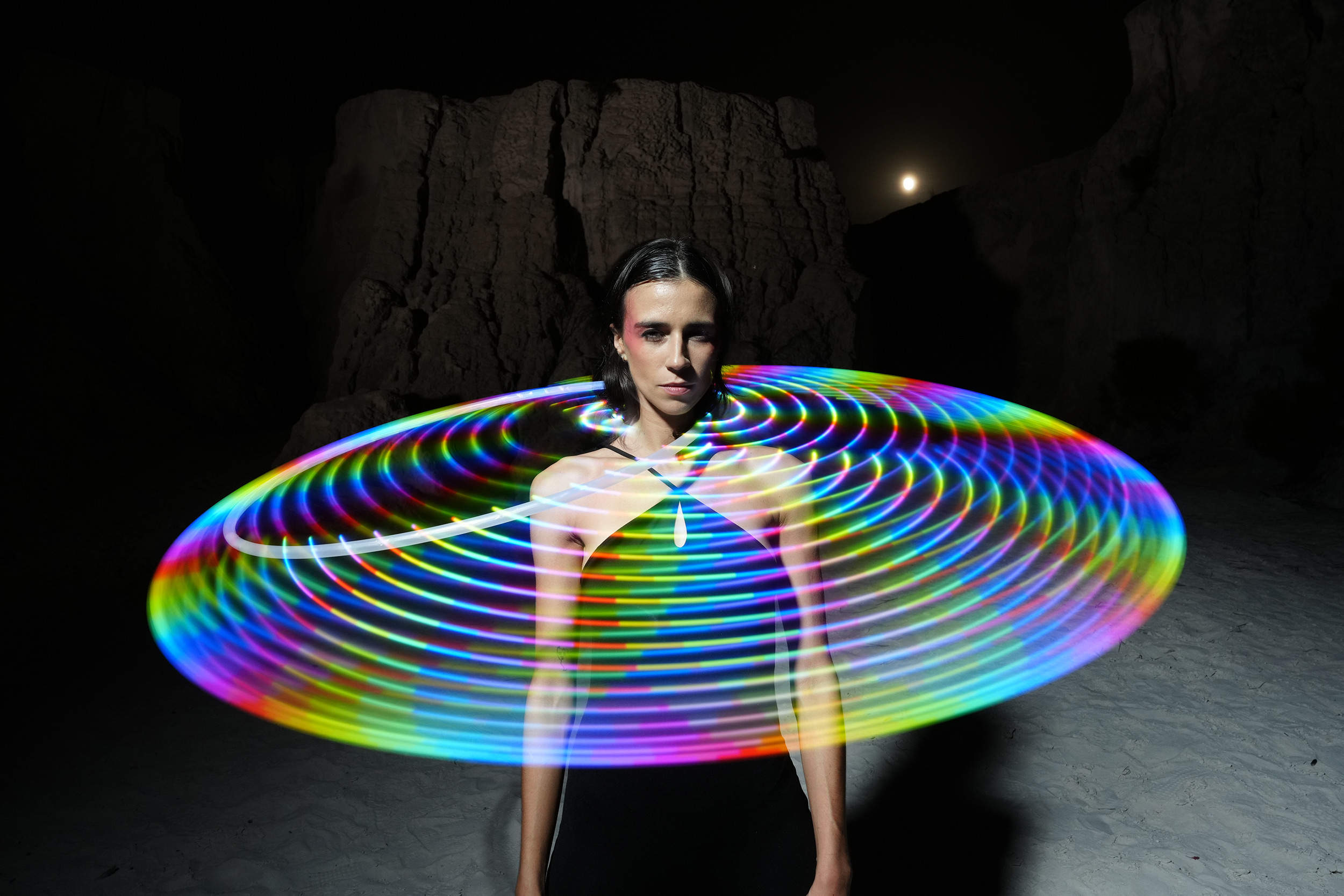 model-with-multicoloured-spinning-lights-around-her-neck.jpg