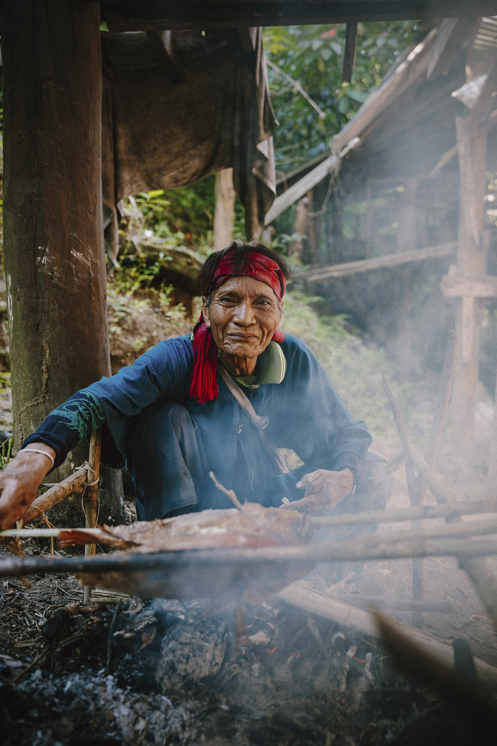 thai-lady-cooking-on-an-open-fire.jpg